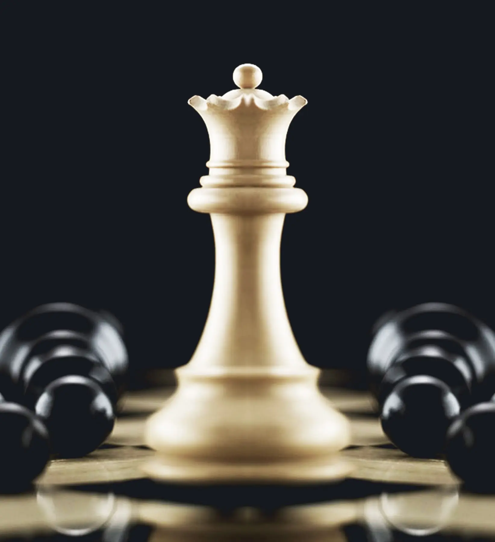 White chess queen standing ahead of pawns