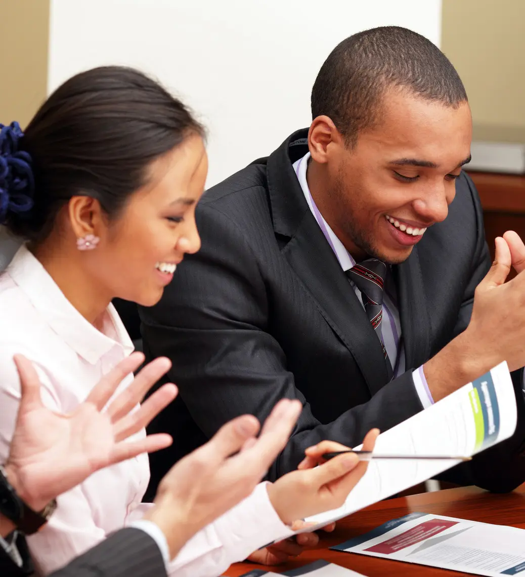 Business consultants collaborating around a table